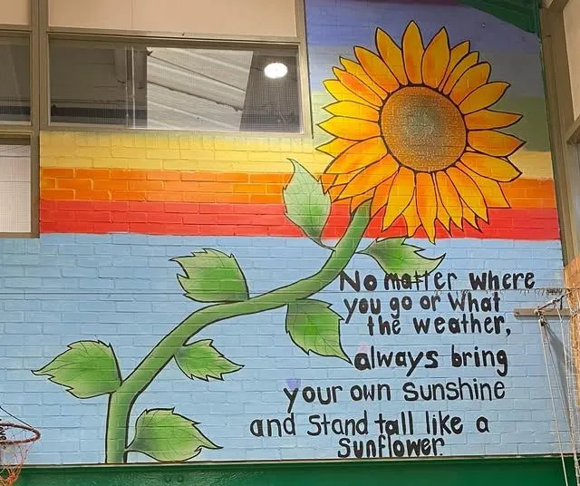 Sunflower mural painted at a school workshop